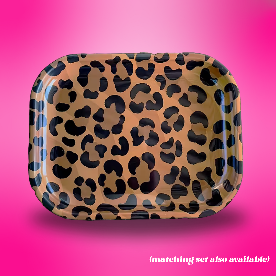 Leopard print tray on a pink background